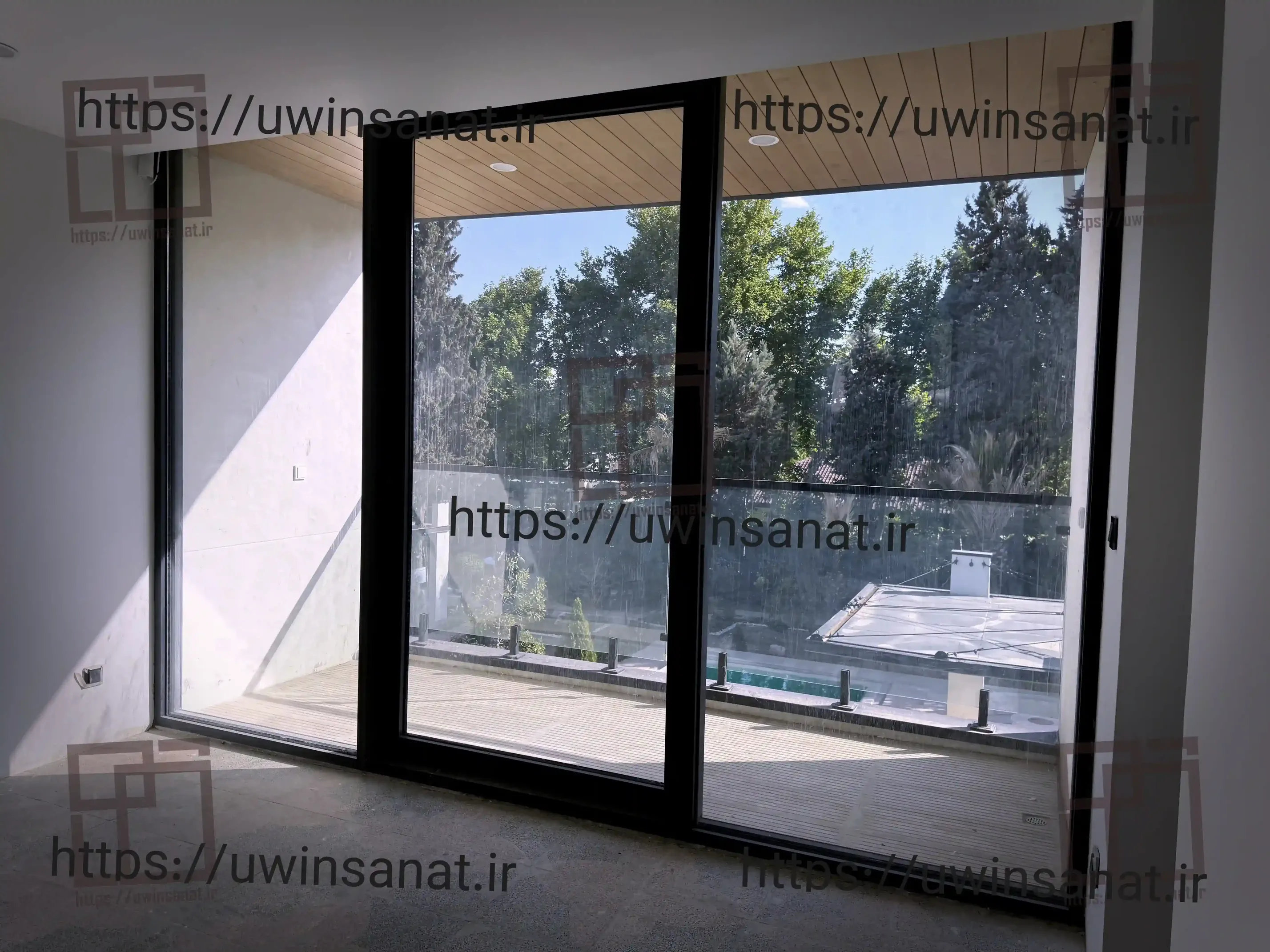 نمای شیشه ای کرتین وال با فریم آلومینیومی در پروژه لادن